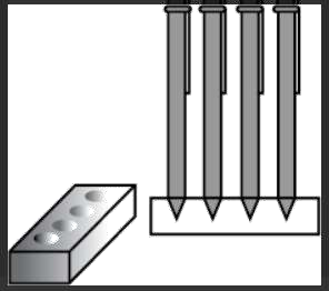 A pen stand made of wood is in the shape of a cuboid with four conical depressions to hold pens