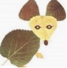 This picture with dried leaves looks like a mouse